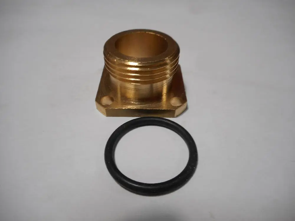 Flansch für Gasventilblock von Remeha, aus Metall, mit Gewinde und zwei Montagelöchern. O-Ring aus Gummi liegt daneben.